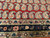 Antique Persian Tehran rug with allover paisley pattern, red field, blue border, circa early 1900s.