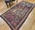 Antique Chondsoresk Caucasian Rug | 19th Century Abrash Green | In-Room View 6