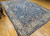 Late 19th Century Antique Persian Ziegler Mahal Sultanabad room size rug. Handwoven with natural vegetable dyes. All-over geometric and stylized floral motifs. Rich navy field. Wide ivory border. French blue accents. Ziegler & Co. style.