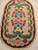 Early 1900s American Hand Hooked Rug with an Floral Pattern in Vintage Bright Colors 1446, 3’ x 4’ 9”, 1st Quarter of the 1900s, The Persian Knot