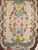 Early 1900s American Hand Hooked Rug with an Floral Pattern in Vintage Bright Colors 1446, 3’ x 4’ 9”, 1st Quarter of the 1900s, The Persian Knot