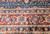 Early 20th Century Vintage Oversize Persian Mahal Sultanabad carpet. Hand-woven. All-over pattern with small medallions and flower heads alternating in columns, connected by curved branches and leaves. Dark navy blue primary field. Dark burgundy border.