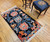 Vintage Tibetan Rug with Lotus Flowers and Cloud Symbols in Navy. Green, Blue, Red, The Persian Knot, SKU 1744