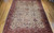 Late 19th Century Antique Persian Ziegler Mahal Sultanabad room size rug. Hand-woven. Rare camelhair or pale saffron yellow background. All-over large scale geometric pattern connected by scrolling lines. Designs in camelhair, navy blue, turquoise blue, green, red, pink, yellow. Red border with geometric designs and scrolling lines/branches.