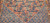 Antique Persian Malayer rug, early 1900s, with geometric design, rust field, French blue spandrels, paisley motifs, and cream border with crab forms.
