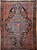 Vintage Persian Farahan rug with pale blue medallion, navy field, red spandrels, and Herati border