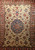 Vintage Persian Tabriz with Large Botanical Designs in French Blue, Ivory, and Salmon Colors 1835, 8’ 2” x 12’ 2”, 1st Quarter of the 1900s, The Persian Knot