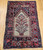 Antique Anatolian Tree of Life prayer rug with ivory field and indigo geometric border, handwoven with natural vegetable-dyed wool, early 1900s, The Persian Knot Gallery, SKU: 1852