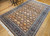 Vintage Turkish Hereke Rug 6x10 | Allover Floral | In-Room View 9