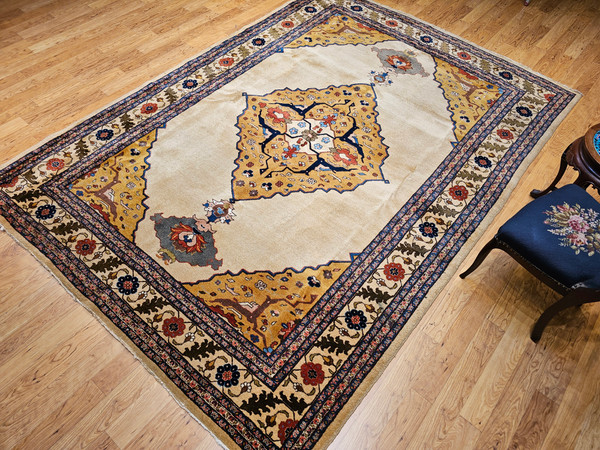 Antique Agra rug from early 1900s India with a yellow medallion, camel field, and Art Deco-inspired botanical motifs, The Persian Knot Gallery, SKU 1619