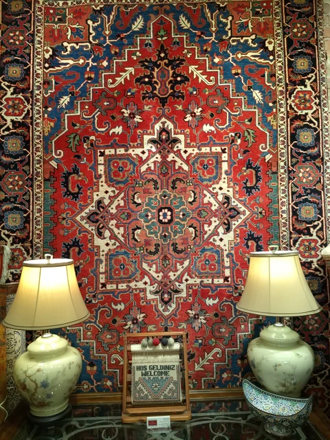 Antique rug styled with lamps in a designed room