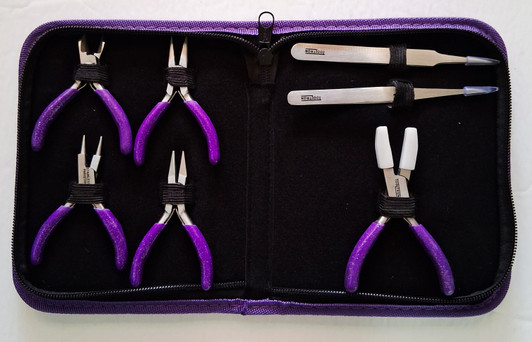 Tooltron 8-piece quilting and beading tool set open in black zippered storage case featuring mini pliers, wire cutters, tweezers, and snips.