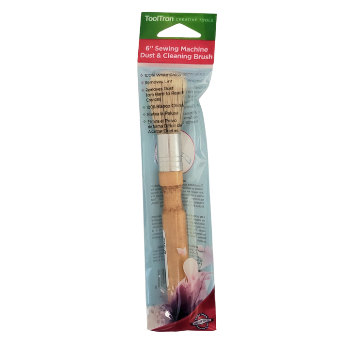Dusting Brush.  100% white China bristles.  Removes dust, dirt, and lint from hard to reach crevices, sewing machine locations and other work areas.