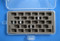 Holds 28 standard-size bobbins in a plastic case.