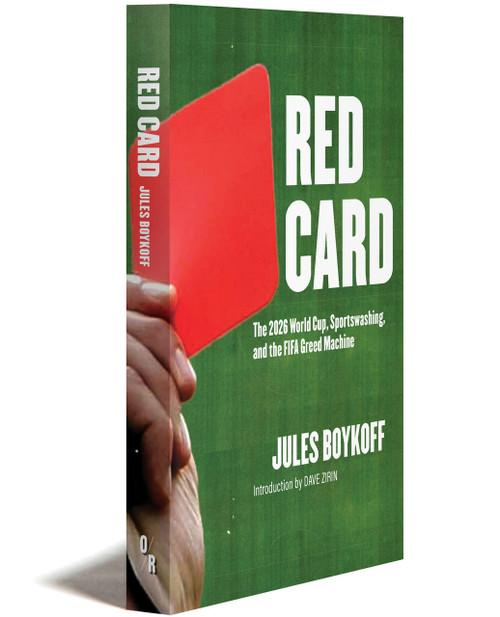 A referee's hand holding a red card against a football field with the title Red Card in big type.
