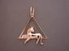 14k yellow gold pendant of cat laying in rectangular frame