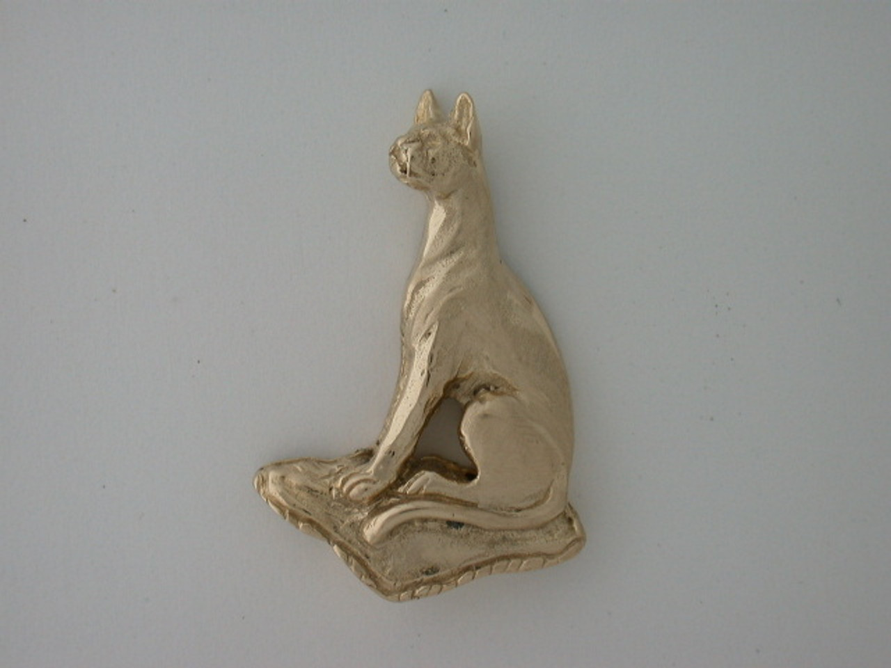 cat sitting on pillow jewelry pendant