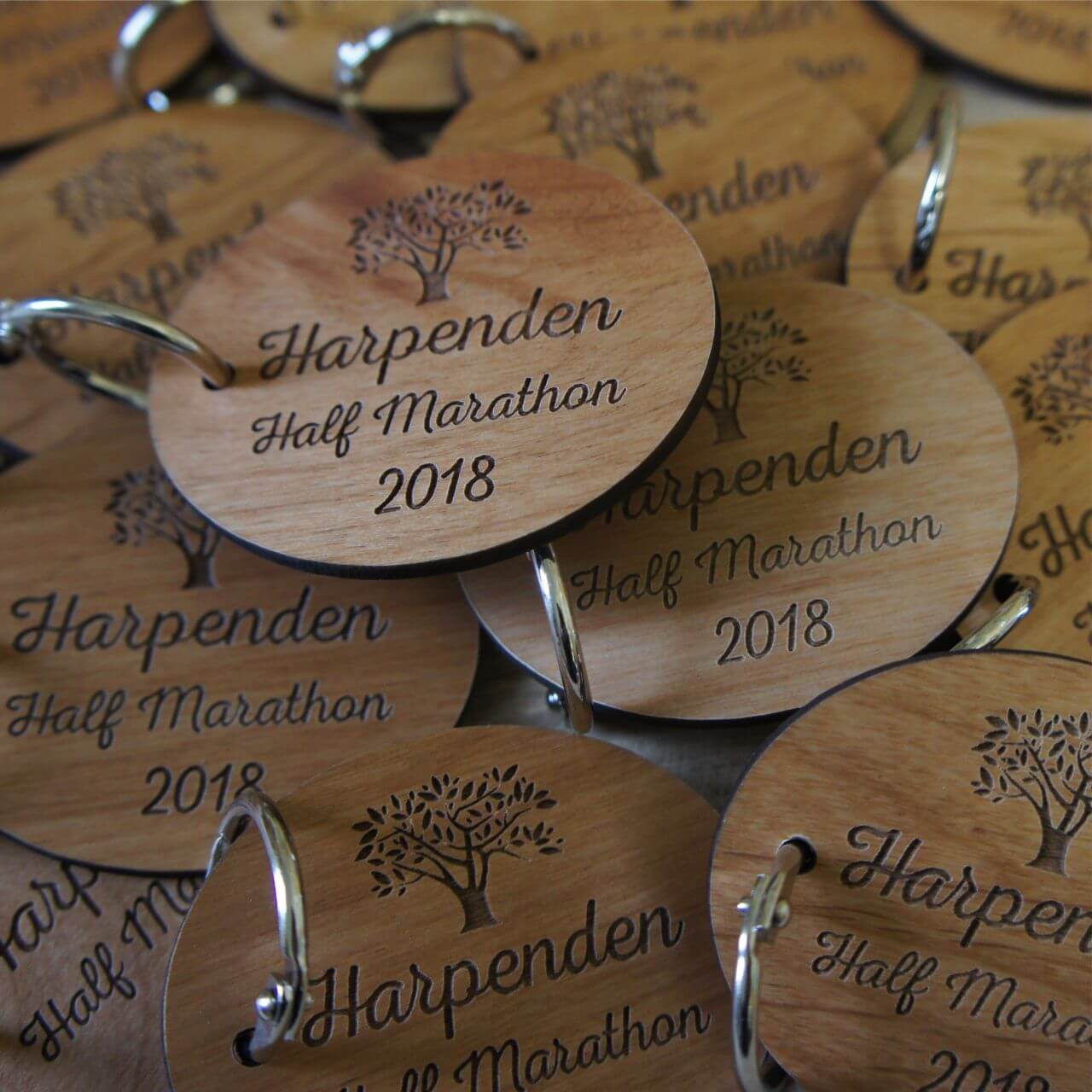 Cam Graphic: printed wooden promotional keyrings keyfobs