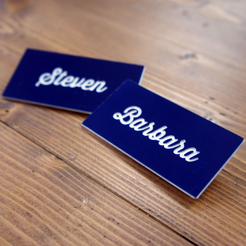 Engraved (laminate) badges with either a pin or magnetic fixing