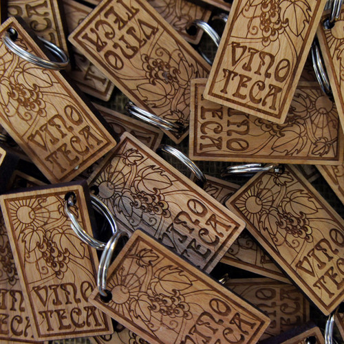 Engraved Cherry Wood keyrings 5mm to 6mm thick - shown with screw connector.  Ideal promotional gifts for businesses and events.