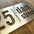 Stainless steel house name and number sign. Stainless steel nameplate.