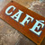 Rusty steel sign with traditional signwriting