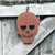 Heart-eyed skull wall decoration made from 1.5mm Corten weathering steel with a natural rusty patina. Decorative gothic metal wall art for gardens, patios and alternative home décor.