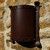 Side view of the Corten steel curved wall light - external garden