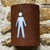 Corten steel curved light with mens toilet symbol