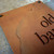 Close up of the cut away edge double layer Corten house name sign