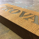 Solid oak sign with inlaid stainless steel lettering / logo / artwork