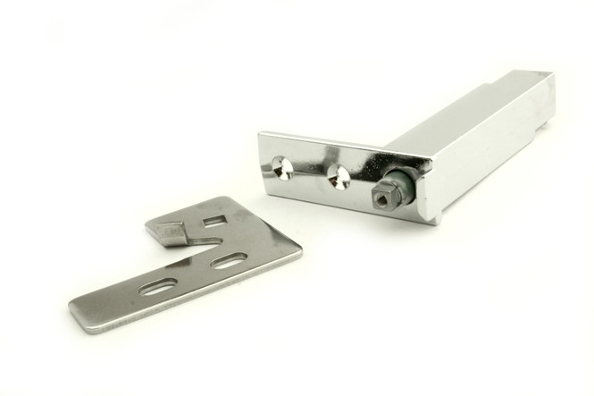 Close-up of the bracket and Kason 1556-570-54 cartridge spring in the 870838 True door hinge kit