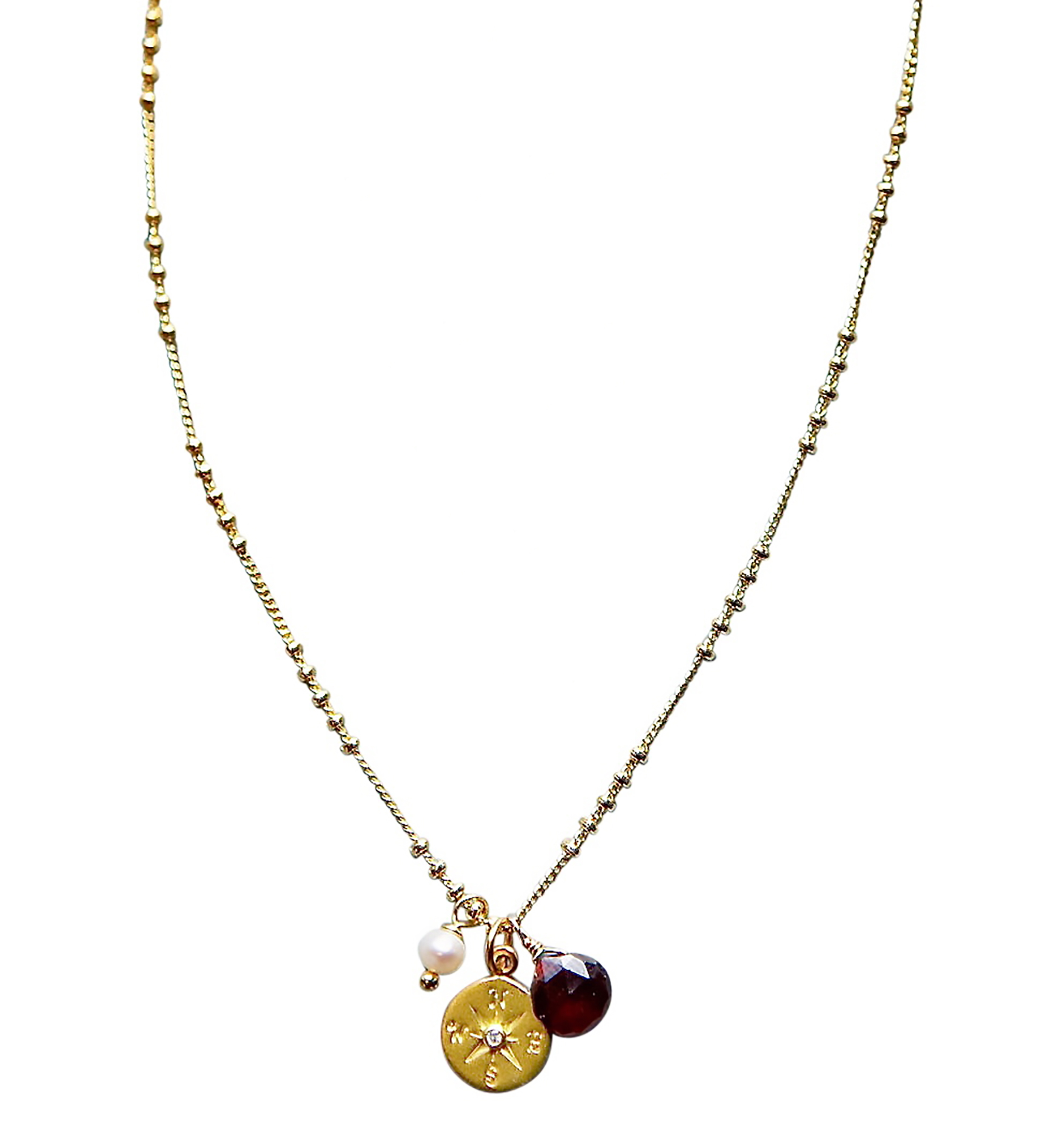 Compass charm with garnet stone for 