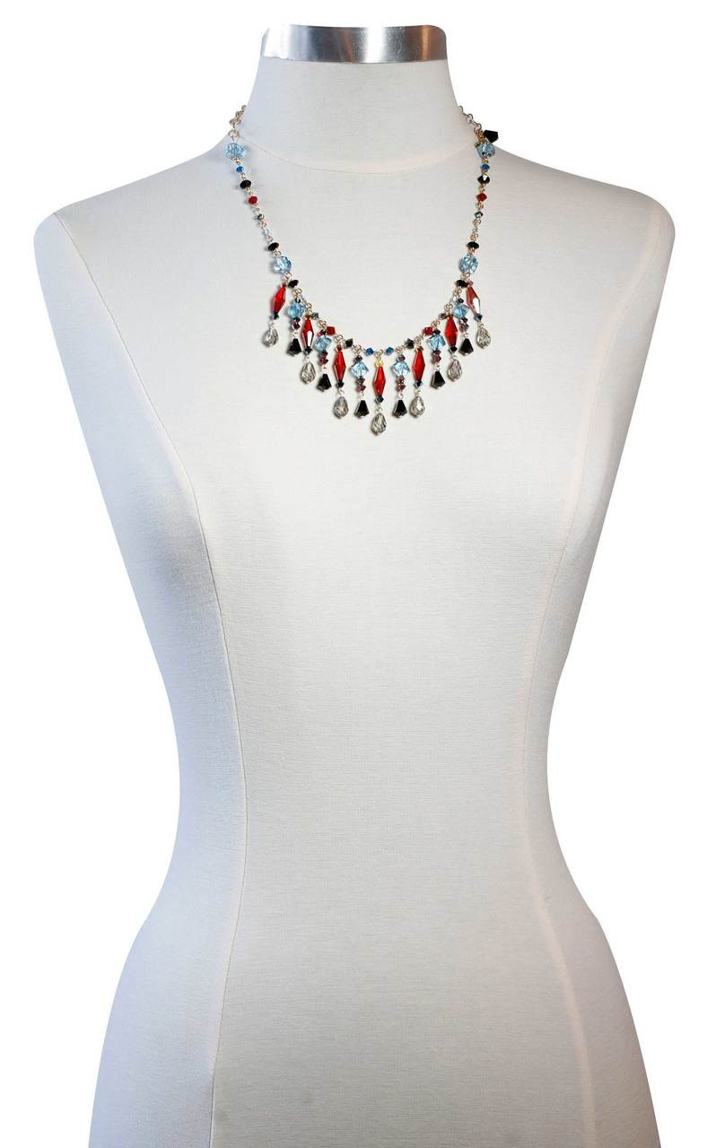Crystal bib necklace made with rare red, blue and black Swarovski •  Handmade with 14K gold filled chain and findings • Original one of a kind  jewelry designs by Karen Curtis in NYC