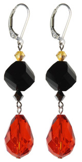 An elegant statement for Halloween. these earrings adorned with rare and dazzling Swarovski crystals in vibrant orange and black with a yellow accent adding a touch of  elegance to your festive look. An elegant statement for Halloween. these earrings adorned with rare and dazzling Swarovski crystals in vibrant orange and black with a yellow accent adding a touch of  elegance to your festive look.
