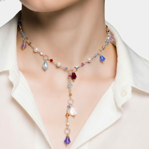 Simple and elegant Wire wrapped in Sterling silver one of a kind drop necklace that can be worn three different ways. On model is worn as a wine necklace but can be worn as a standard necklace or a choker.