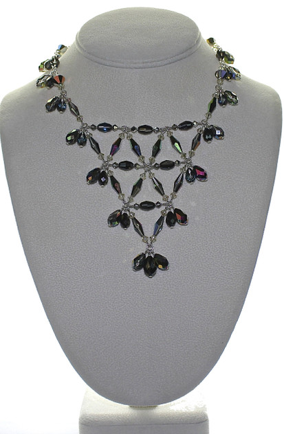 Beautiful weave of crystals and sterling silver make this necklace the right choice for fashionable events.