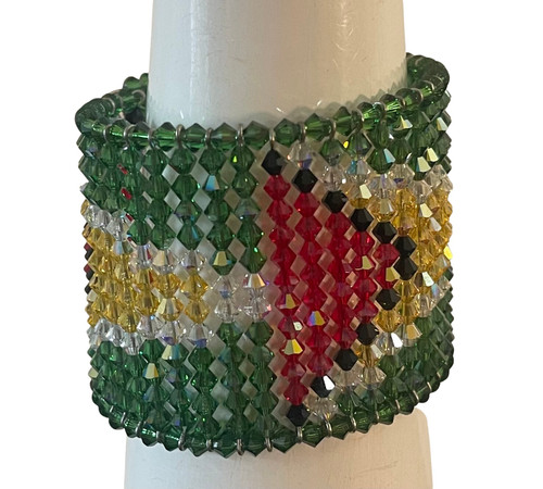 True to color. New Green - Fern Green will be the main color with no outline. Other images are fore pattern only.

Guyana Flag Bracelet with Crystals from Swarovski By designer karen curtis 