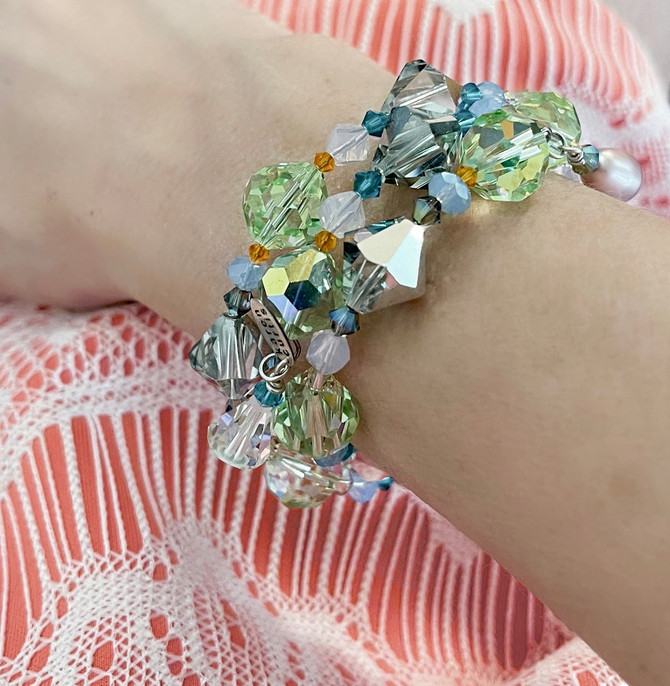 pastel colored Swarovski Crystal coil wrap bangle bracelet by designer Karen Curtis Jewelry NYC