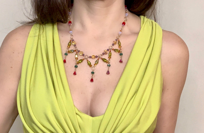 Limited edition statement necklace by Designer KarenCurtis. multicolored Swarovski crystals on 14 karat gold filled metal