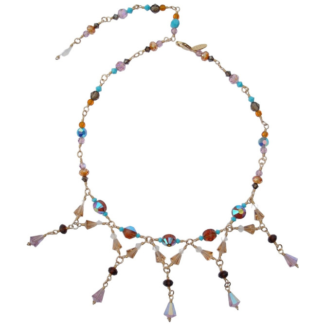 One of a kind, 14 karat gold filled and colorful crystals by Swarovski handcrafted in New York City by designer Karen Curtis. Make a statement from date and night with this divine style statement necklace.