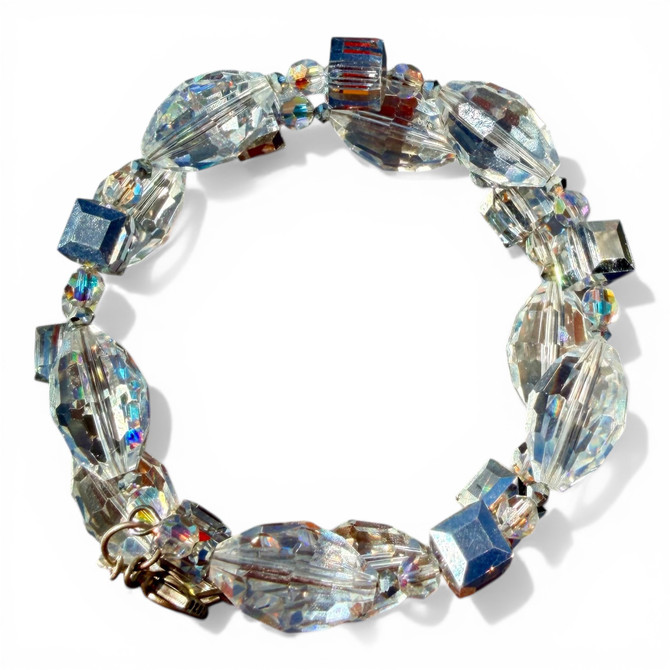 Hand crafted Bangle Bracelet made with Swarovski® Elements.  Limited edition with clear and silver crystals