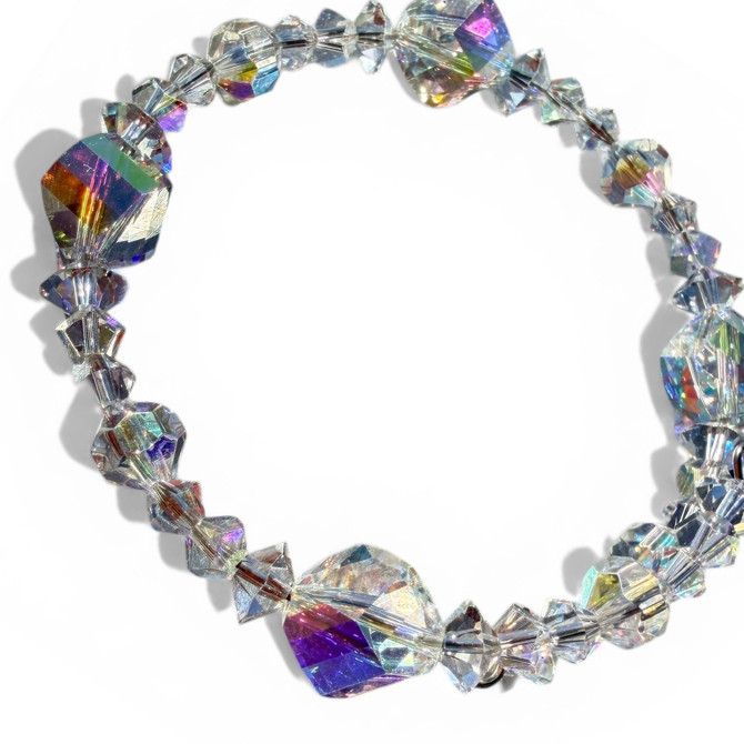 Crystal bangle stackable bracelet made with crystals from Swarovski. Finished with sterling silver by designer Karen Curtis. Made in NYC