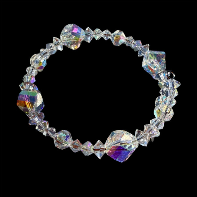 Crystal bangle stackable bracelet made with crystals from Swarovski. Finished with sterling silver by designer Karen Curtis. On maniquin
