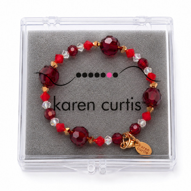 Red crystal bangle stacking bracelet with rare Swarovski in packaging