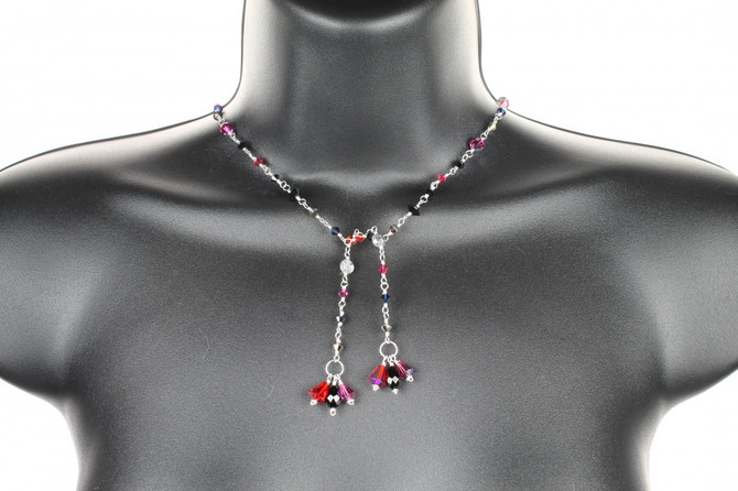 Handcrafted using sterling silver in a wire wrapping technique.  This necklace is created using a variety of rare, antique, and modern day Swarovski crystals.  The simple single strand design makes this the perfect everyday item.