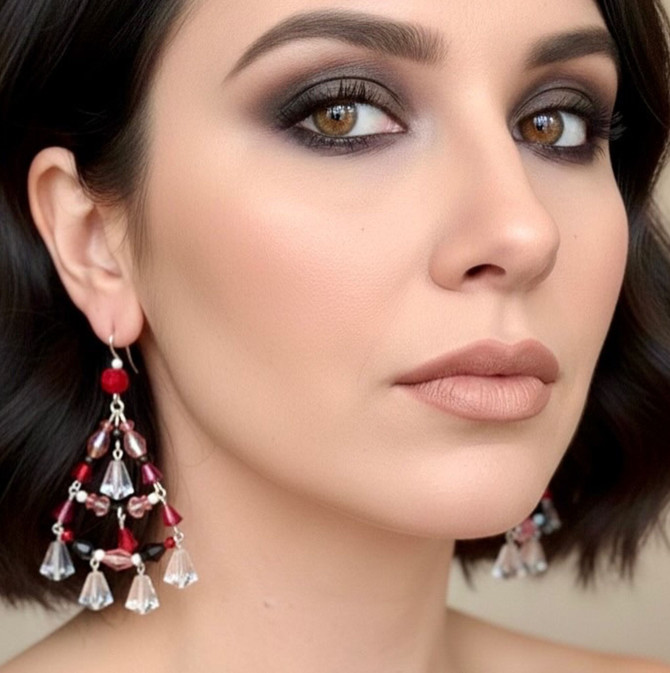 Each pair is carefully designed and assembled by New York designer Karen Curtis, making them a true collectible piece of wearable art.