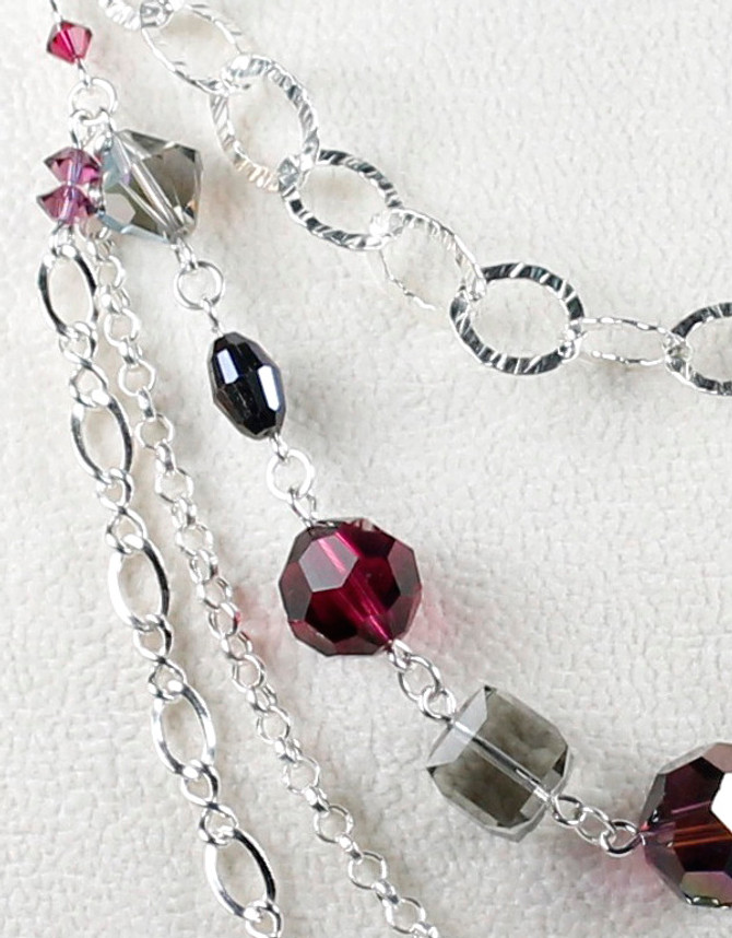 Close-up of sterling silver chain and crystal necklace by Karen Curtis NYC