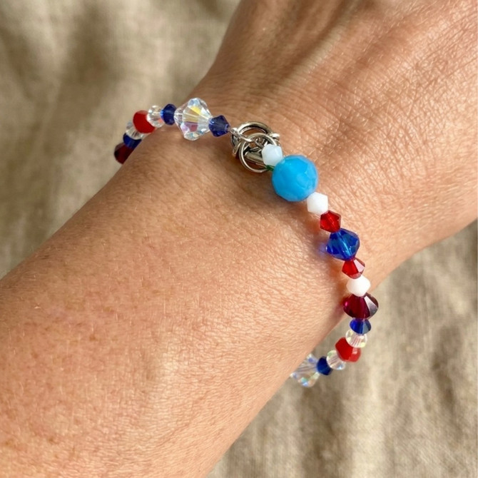 Red, white & blue Crystal bangle bracelet on arm