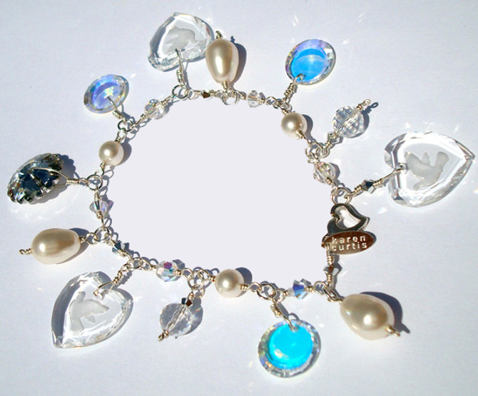 Hand crafted Sterling Silver Bridal Charm Bracelet made with SWAROVSKI ELEMENTS